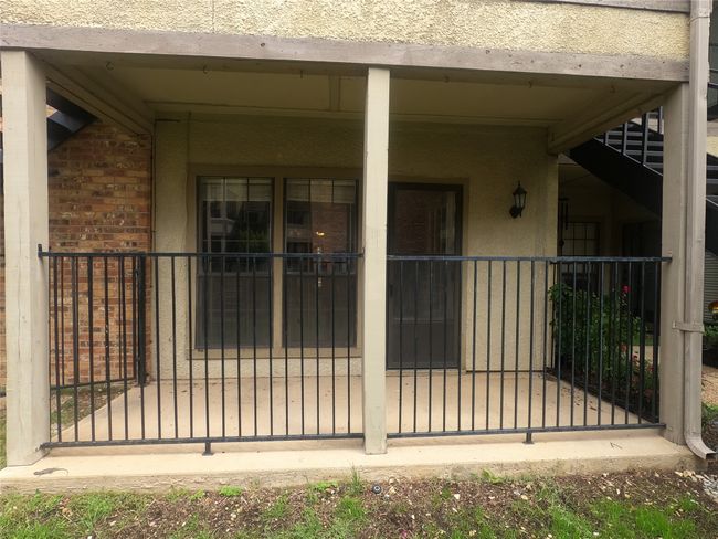 Entrance to property with brick siding and a gate | Image 9