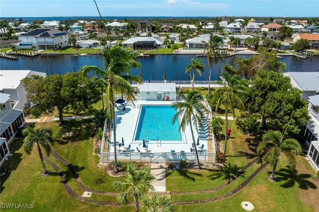 Drone / aerial view of community pool featuring a water view | Image 47
