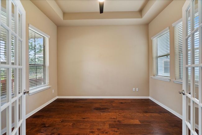 Beautiful glass doors welcome you into an office with a lot of natural light. | Image 4