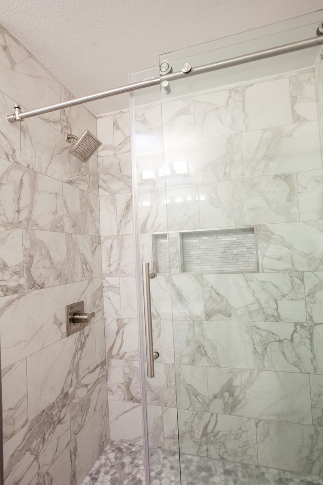 Full bath with a shower stall and a textured ceiling | Image 29