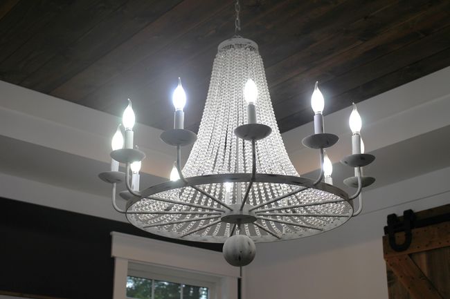 Master bedroom has chandelier and recessed lighting | Image 74
