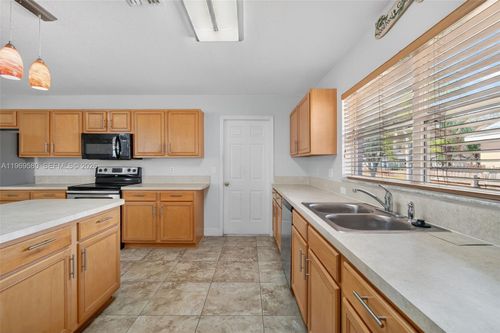 6762 Nw Daffodil Ln, Port St. Lucie, FL, 34983-1415 | Card Image