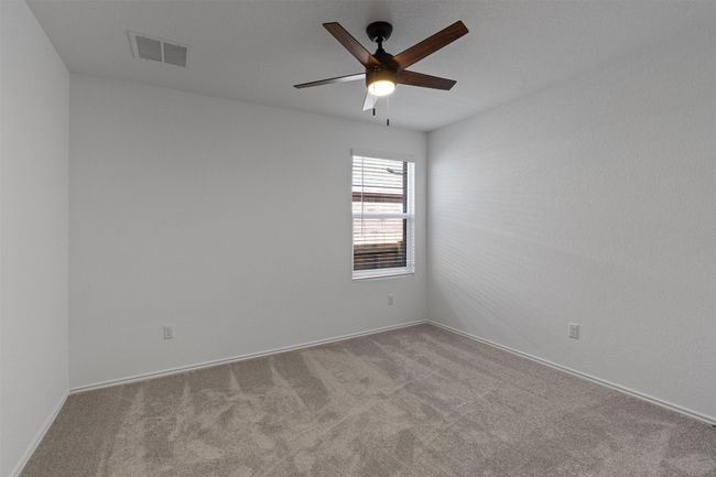 Empty room featuring carpet and ceiling fan | Image 22