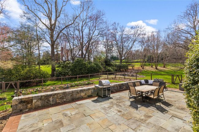 New 18" sitting wall, beyond the patio are beds for veggies and flowers | Image 23