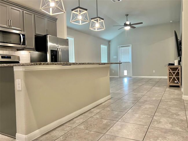 Enjoy elegant, upgraded tile flooring throughout the entire home. | Image 7