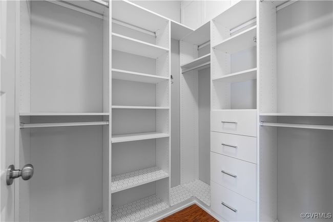 View of spacious closet | Image 11