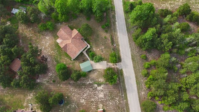 Home is located next to paved road! | Image 27
