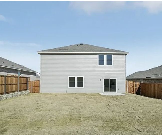 Rear view of house featuring a fenced backyard | Image 4