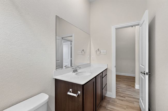 Bathroom featuring wood finished floors and vanity | Image 31