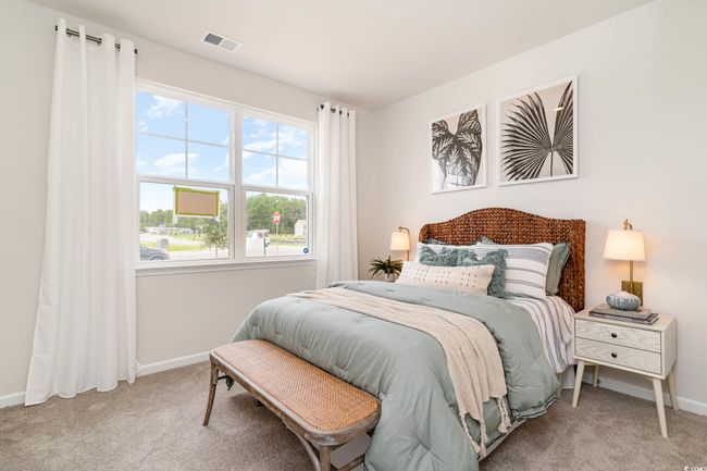 Carpeted bedroom with baseboards and visible vents | Image 17