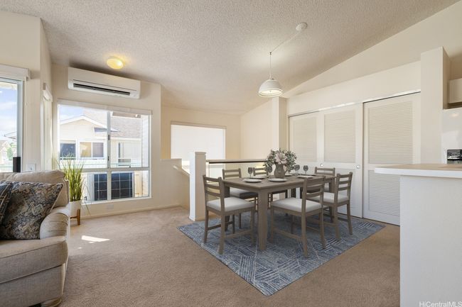 Open Concept Living with high vaulted ceilings & space for a full size dining table. | Image 4