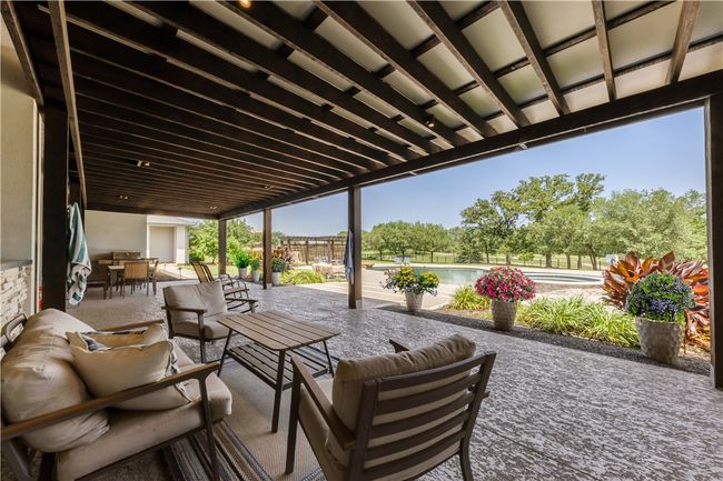 View of patio / terrace with outdoor lounge area, an outdoor pool, and outdoor dining space | Image 8