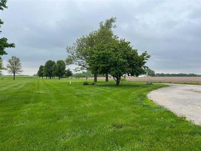 View of green lawn featuring a view of countryside | Image 28