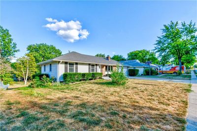 Ranch-style house with a front lawn | Image 2