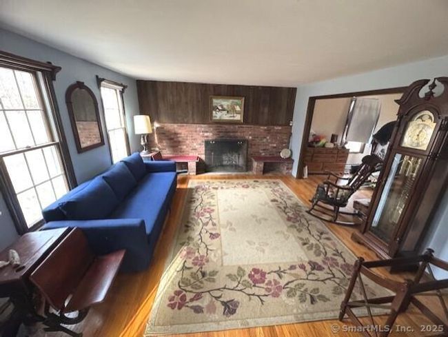 Front living room, wide entry to "den" | Image 7