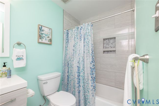Full bathroom with vanity and shower / bathtub combination with curtain | Image 30