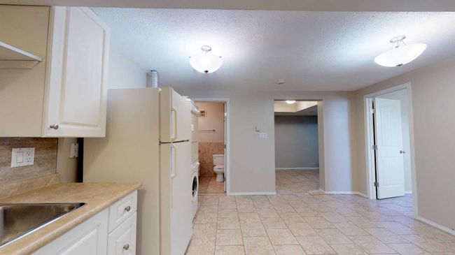 9837 100 A Avenue, Home with 4 bedrooms, 2 bathrooms and 3 parking in Sexsmith AB | Image 36