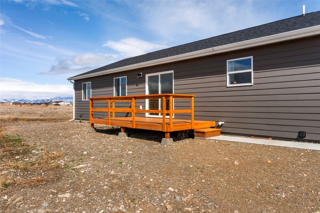 Back of property featuring a deck with mountain view | Image 23