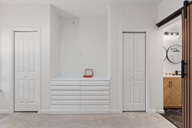 Corridor with carpet floors and baseboards | Image 11