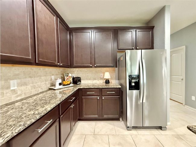 Refrigerator stays with the home | Image 14