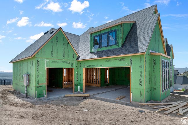 View of front of property with roof with shingles and a garage | Image 5