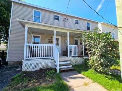 This side by side duplex offers a vacant unit and one that is currently rented. A possibility for ower occupied. | Image 1