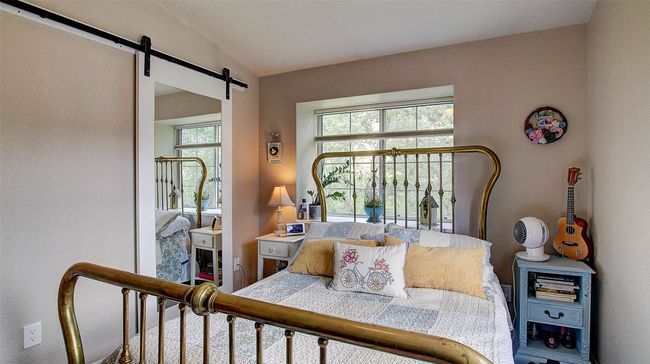 Bedroom with a barn door | Image 20