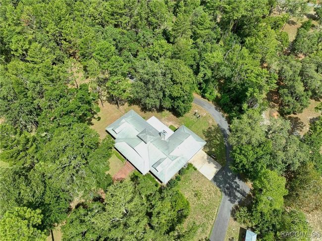7802 Fairwind Loop, House other with 3 bedrooms, 2 bathrooms and 2 parking in Hernando FL | Image 45