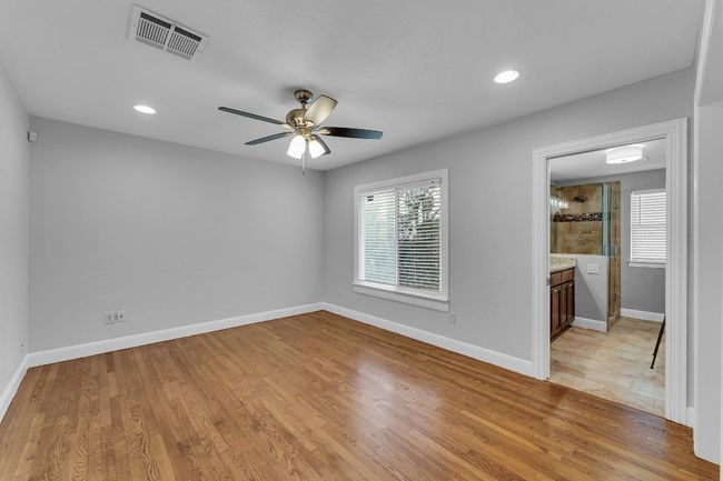 Spacious primary bedroom | Image 10