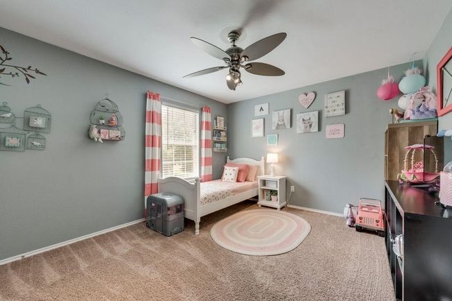 Bedroom featuring carpet and a ceiling fan | Image 16