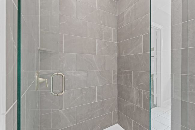 Bathroom with a stall shower | Image 24
