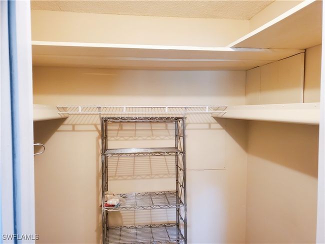 View of walk in closet | Image 16