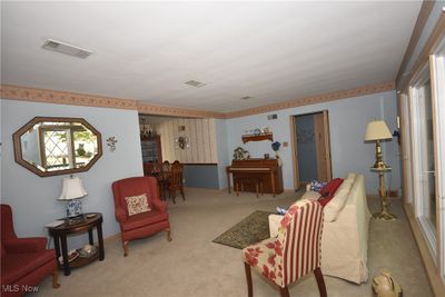 View of carpeted living room | Image 2