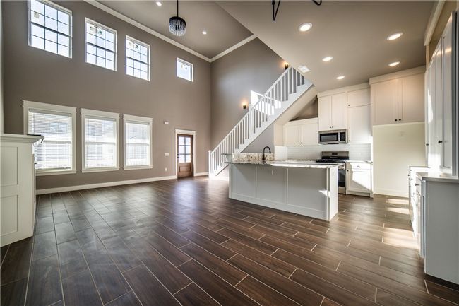 Soaring ceilings in open concept living area | Image 4