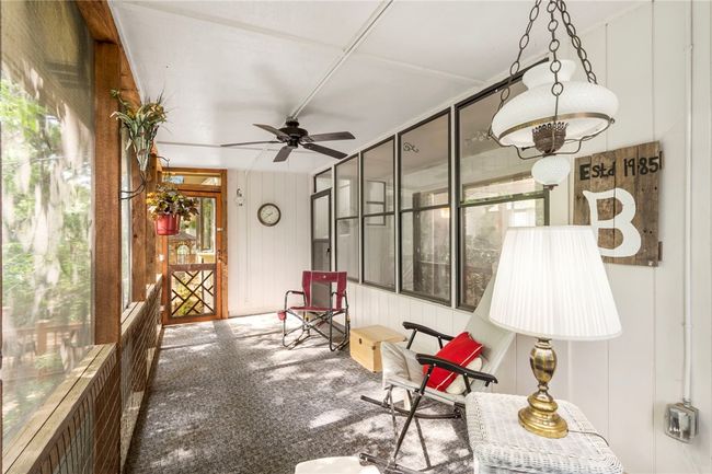 Screened in back deck. | Image 15