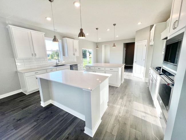 Plenty of natural light, countertop space, and gourmet appliances make cooking and baking even more enjoyable! | Image 14