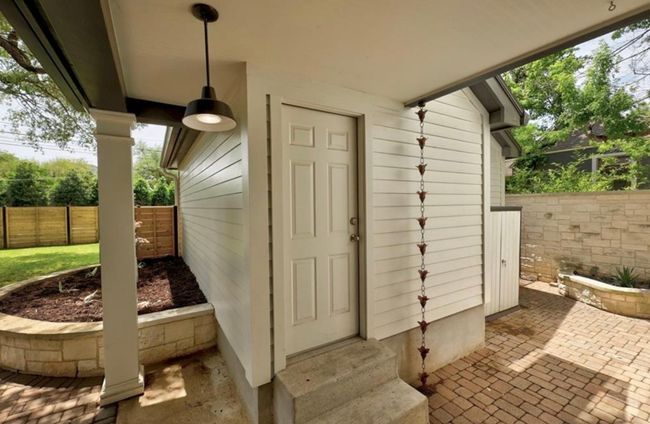 Entrance to property featuring a patio and fence | Image 29