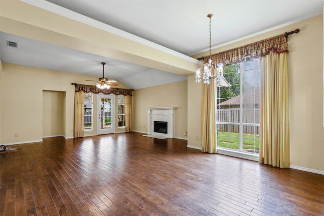 The large living area offers ample space for entertaining without sacrificing warmth and charm for those relaxing evenings spent enjoying the family. | Image 10