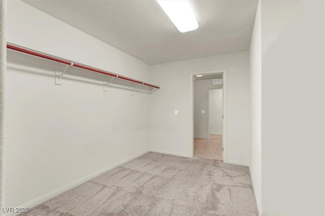 Spacious closet with carpet flooring | Image 43