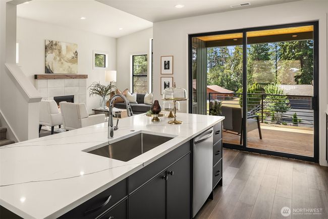 As the newest PNW master-planned community, enjoy 200+ acres of open space, trails & the Coal Trax Mt Bike Park. Soaring ceilings in the great roommake each day worthy of celebration & open floorplan appeals to entertaining. Covered deck & patio. Southern-facing homesites range from the mid600s- 900ks. Enjoy a variety of innovative & distinctive new home options with the best all-season recreation just moments away! Built for the future, indulge in a retreat just 90-min to Seattle. Plans and elevations are artist’s renderings only, may not accurately represent the actual condition of a home asconstructed and may also contain options and upgrades which are not included in the sale. Trailside Homes reserves the right to make changes to the floorplan, specifications, dimensions, design and elevations without prior notice. Stated dimensions and square footage are estimated and should not be usedas representations of the home’s actual size. | Image 25