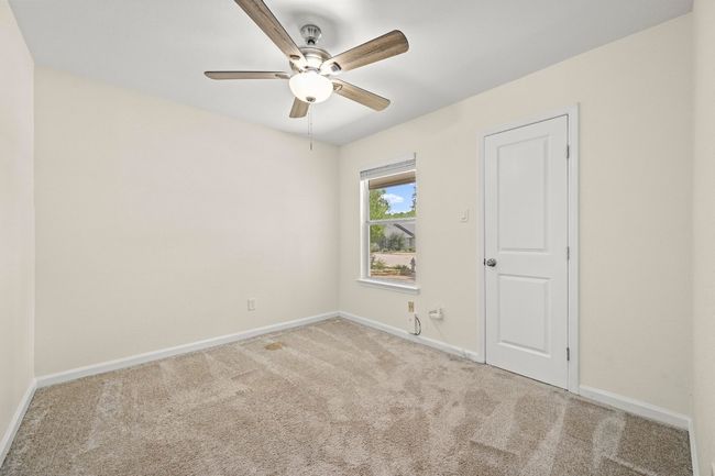 The second of the bedrooms is also versatile and features a walk in closet. | Image 16