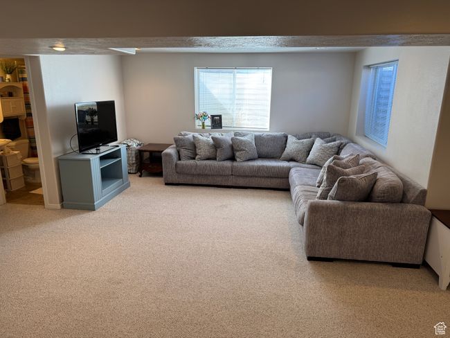 View of carpeted living area | Image 13
