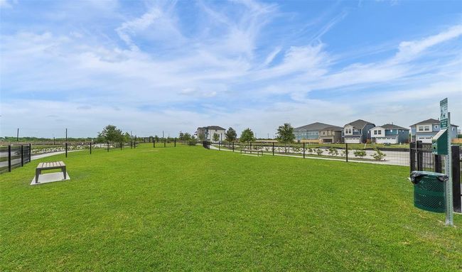 Bring your dogs to this fenced dog park for outdoor fun. | Image 23