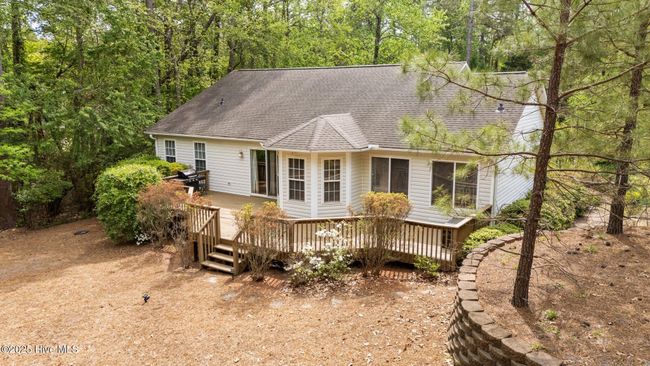 Large back deck for relaxing. | Image 4