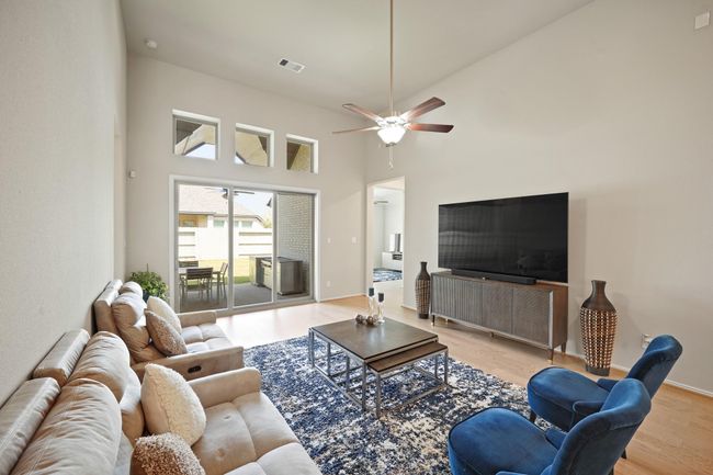 Welcome to a living room thateffortlessly combines comfort andstyle. The flow in this home is perfect! | Image 14