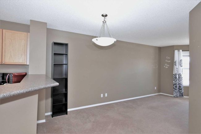 121 Tuscany Springs Gardens Nw, Home with 2 bedrooms, 2 bathrooms and 2 parking in Calgary AB | Image 6