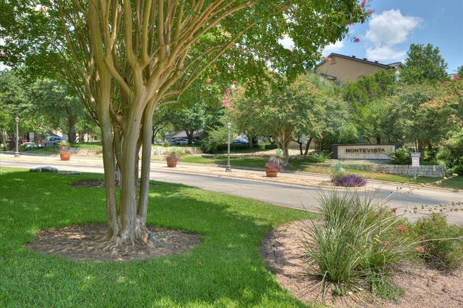View of community with a yard | Image 13