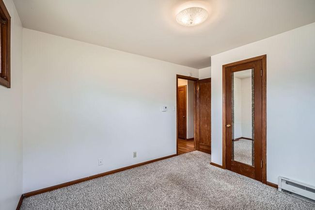 Primary Bedroom with overhead light | Image 15
