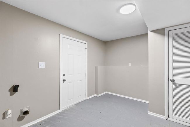 Laundry room with hookup for an electric dryer, baseboards, and laundry area | Image 21
