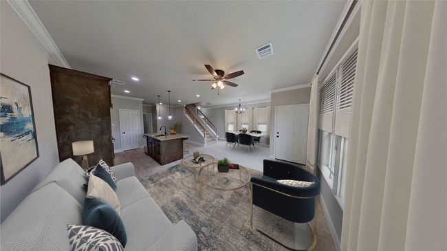 Virtually Staged. Living room with stairway, visible vents, crown molding, and recessed lighting | Image 4
